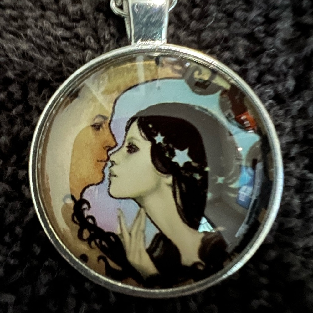 Artistic Silver Pendant Necklace with Crescent Moon Design